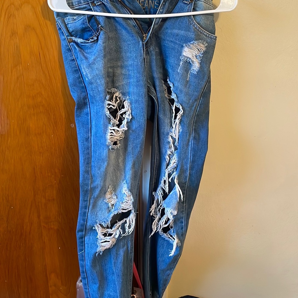Ripped blue jeans